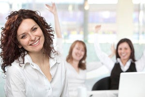 three young business girls team in office