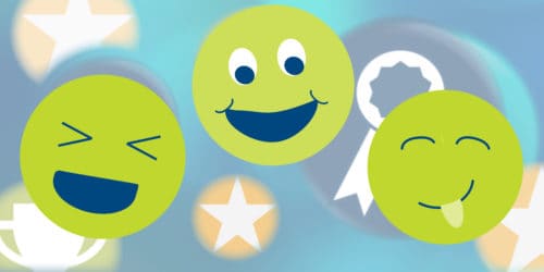 Green emoji faces on a blue award background