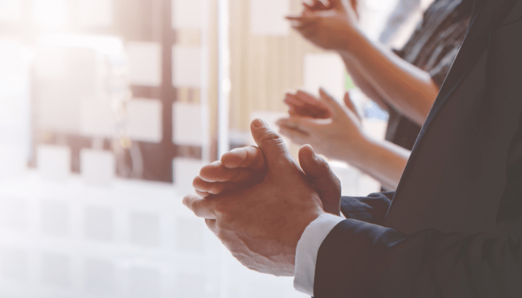 Important Employees Clapping for Recognition