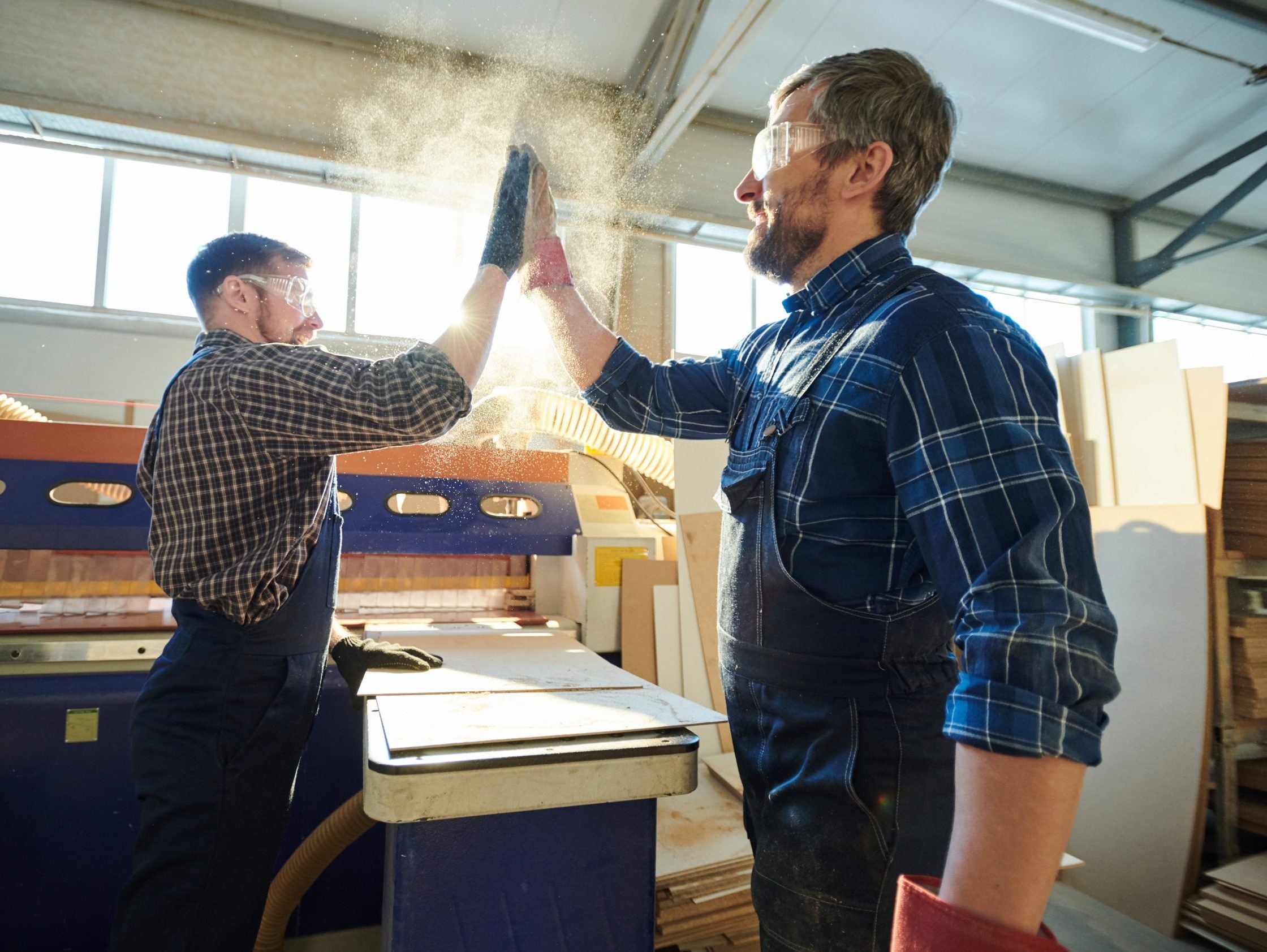 Positive,Satisfied,Bearded,Factory,Workers,Standing,At,Workbench,With,Particleboard Positive,Satisfied,Bearded,Factory,Workers,Standing,At,Workbench,With,Particleboard