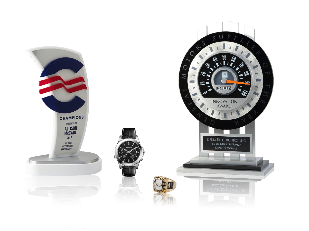Sales Awards Group of table top awards, a ring and a watch
