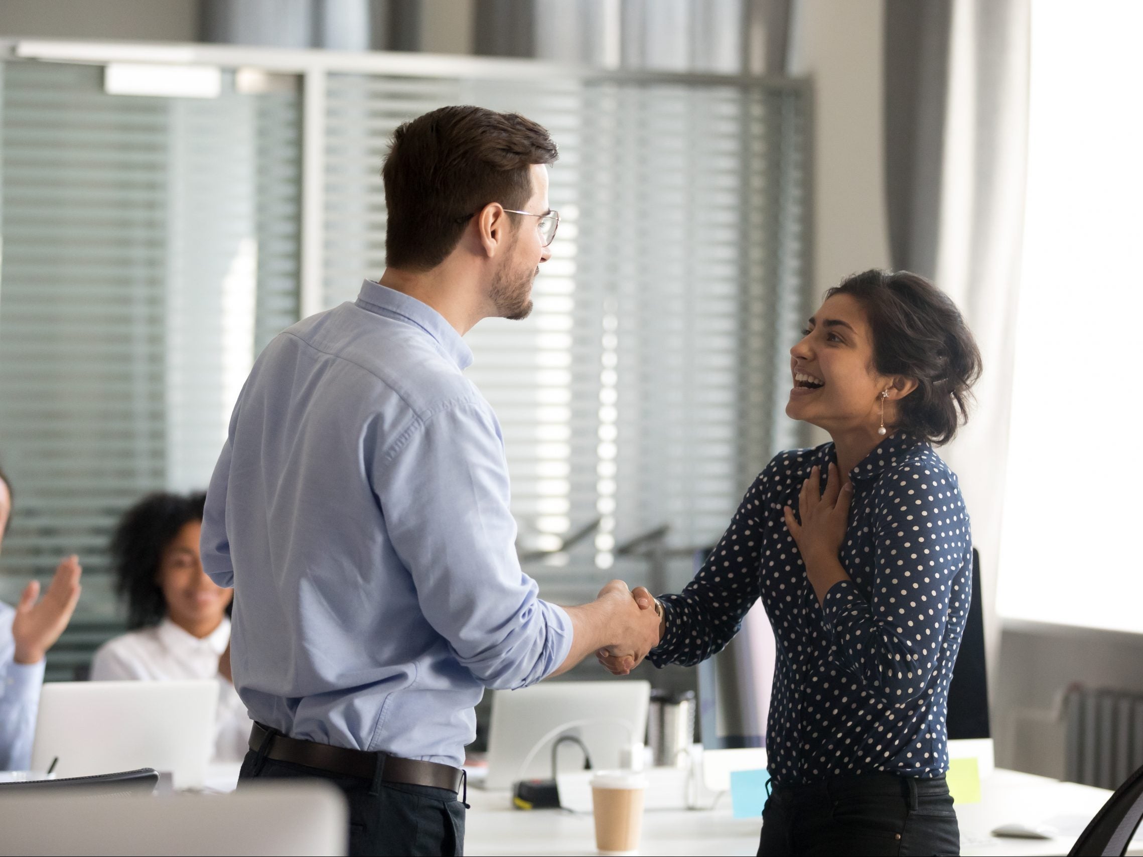 Team,Leader,Motivating,Handshaking,Female,Indian,Excited,Employee,,Congratulate,With Leader giving recognition to employee