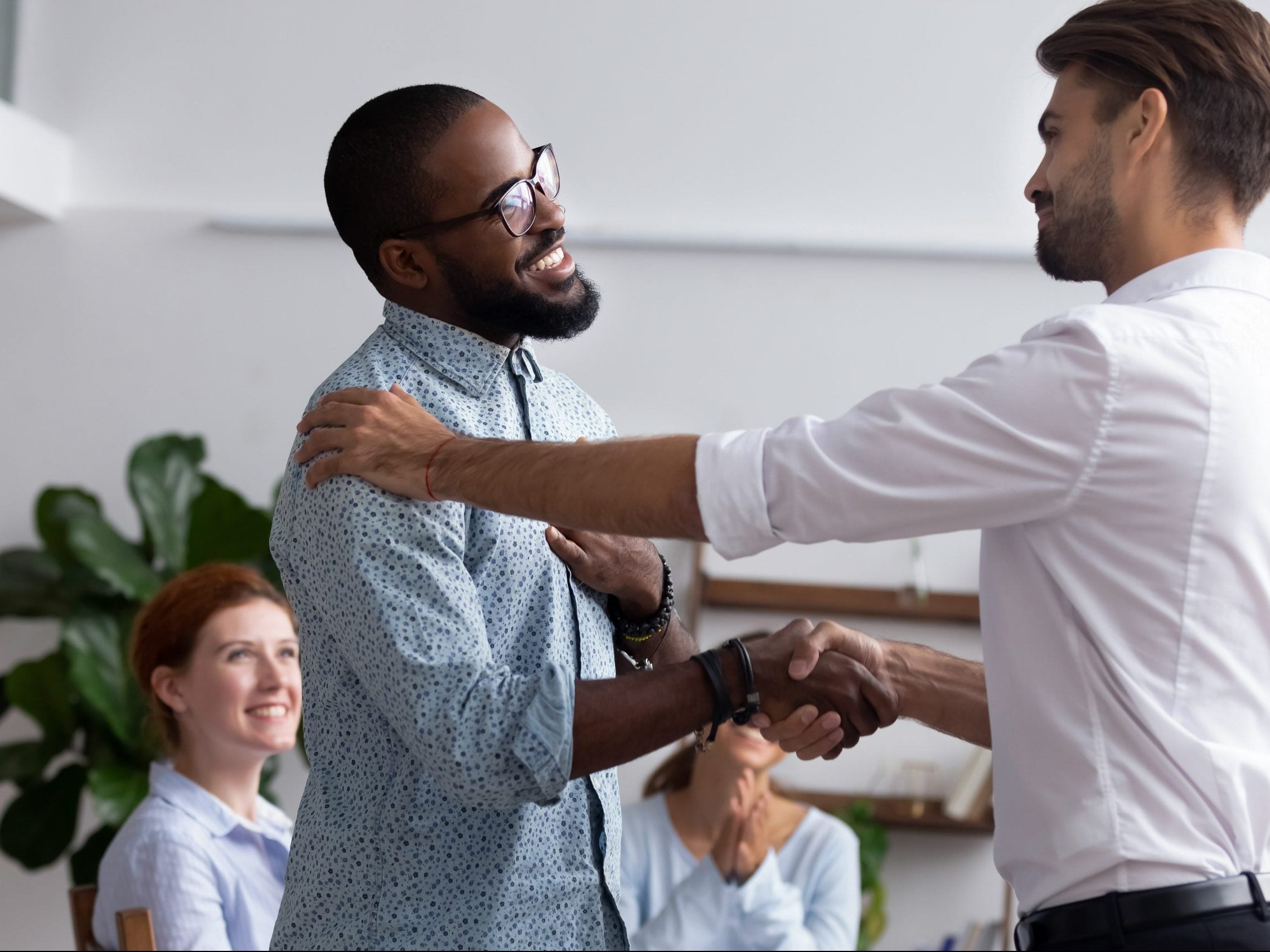 Diverse,People,Gathered,In,Meeting,Executive,Manager,Shake,Hands,With Diverse,People,Gathered,In,Meeting,Executive,Manager,Shake,Hands,With
