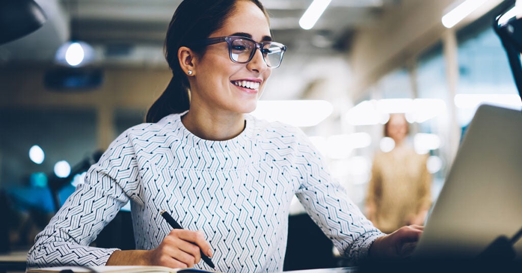 Happy employee woman receiving public recognition