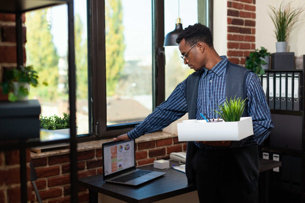 employee walking away from desk