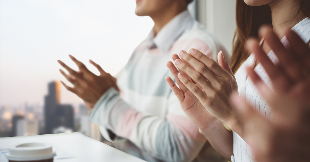 people clapping for an employee workaversary