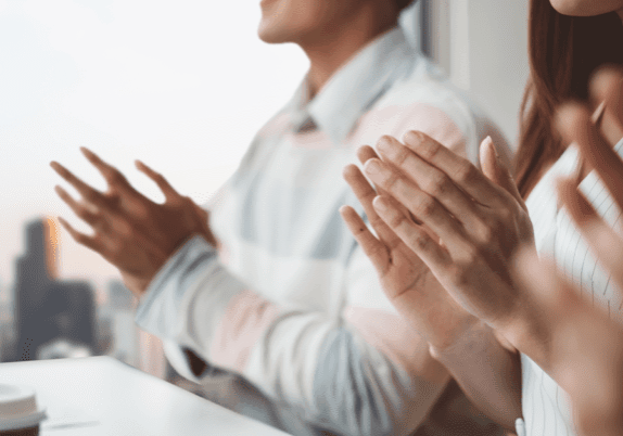 people clapping for an employee workaversary