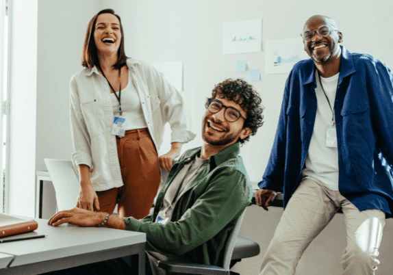 Happy group of three employees